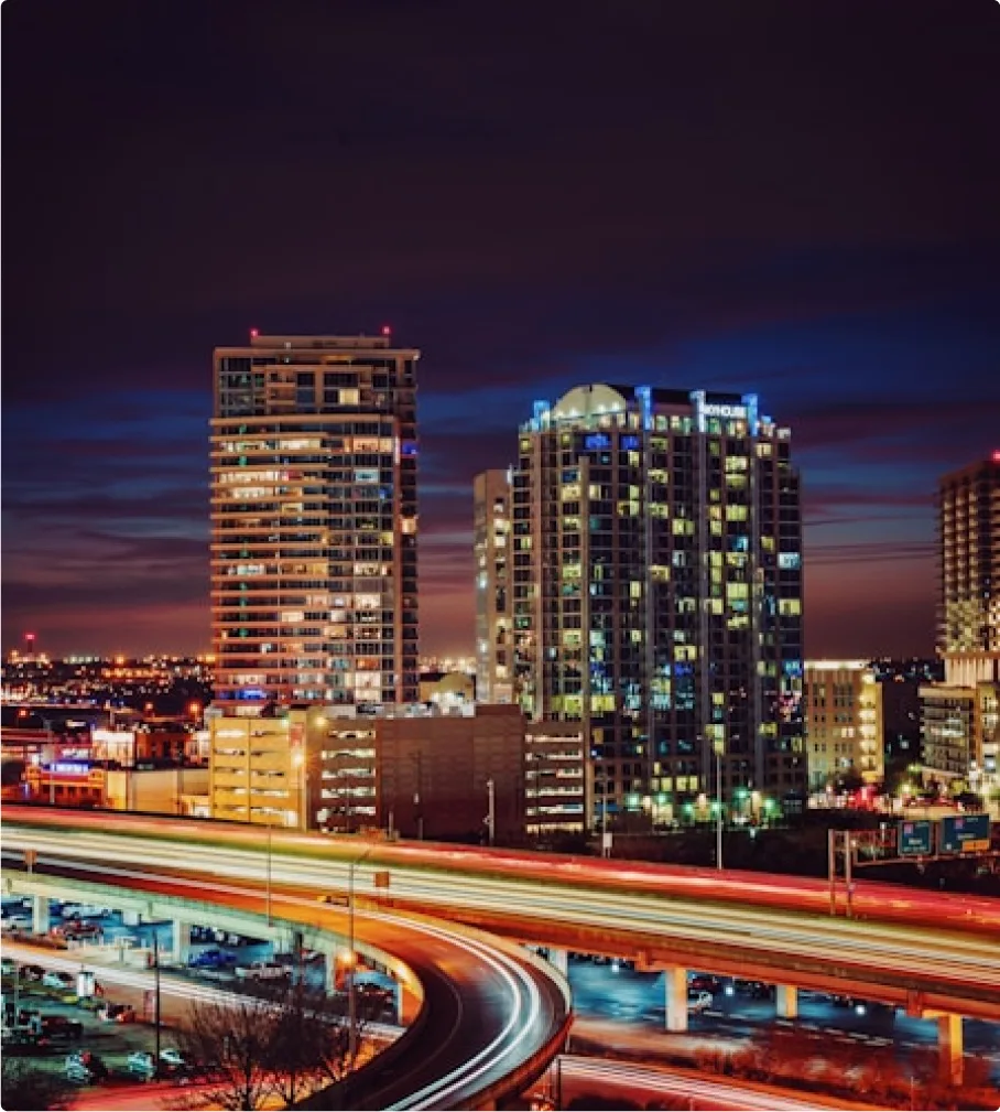 Nighttime aerial image of Dallas, TX